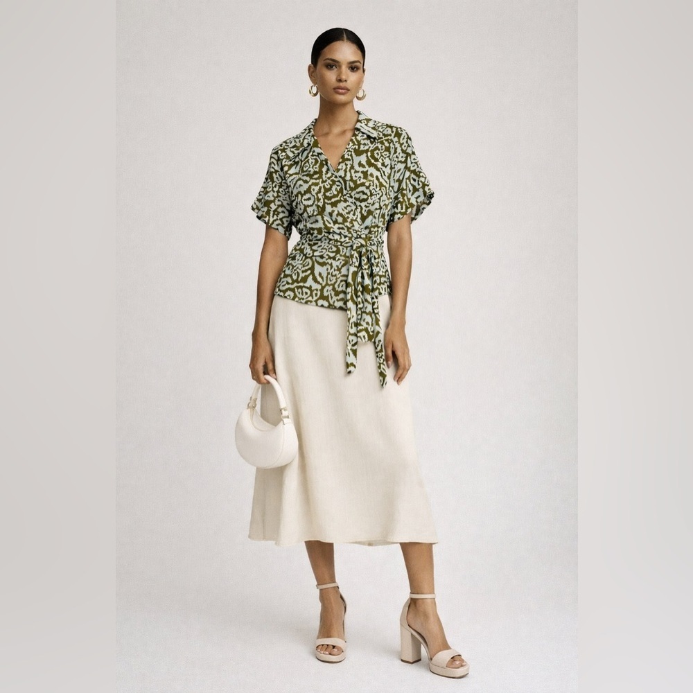 Diane Von Furstenberg silk ikat print wrap top. Size medium.
